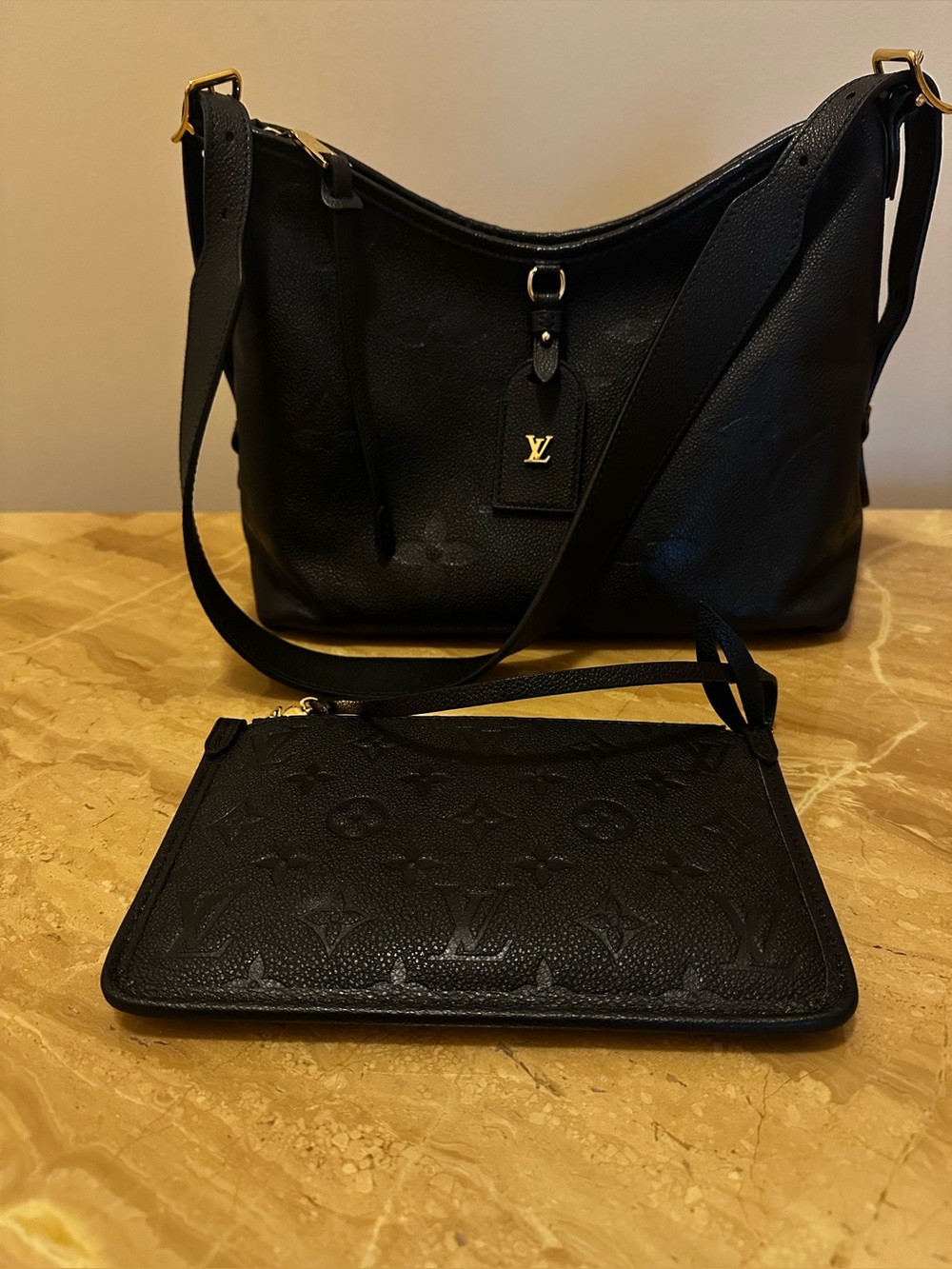 Louis Vuitton CarryAll PM bag in Monogram Empreinte